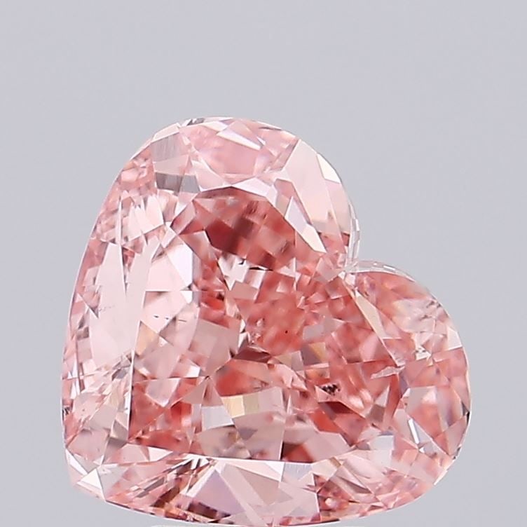 Loose Diamond - HEART 5.02ct Fancy Vivid Pink SI1: Loose Diamond - HEART 5.02ct Fancy Vivid Pink SI1 Source: This is a real non-mined Diamond that has been grown in a lab Shape: HEART Carats: 5.02 Color: Fancy Vivid Pink Certification: IGI Video: