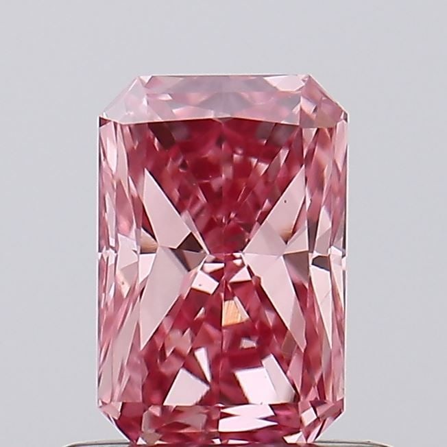 Loose Diamond - RADIANT 0.6ct Fancy Vivid Pink VS1: Loose Diamond - RADIANT 0.6ct Fancy Vivid Pink VS1 Source: This is a real non-mined Diamond that has been grown in a lab Shape: RADIANT Carats: 0.6 Color: Fancy Vivid Pink Certification: IGI Video: