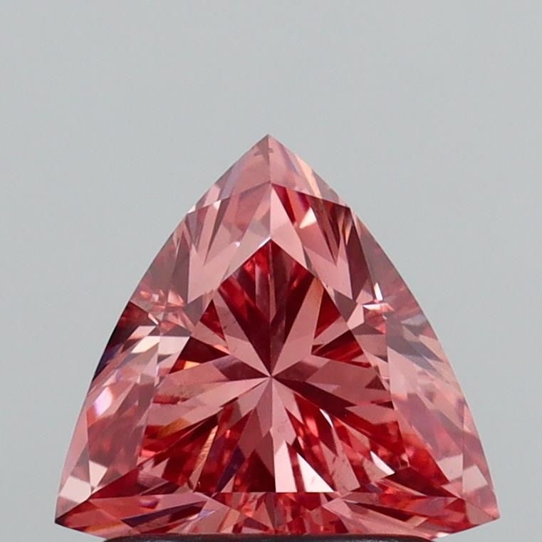 Loose Diamond - TRIANGULAR 1.03ct Fancy Vivid Pink VS2: Loose Diamond - TRIANGULAR 1.03ct Fancy Vivid Pink VS2 Source: This is a real non-mined Diamond that has been grown in a lab Shape: TRIANGULAR Carats: 1.03 Color: Fancy Vivid Pink Certification: IGI V
