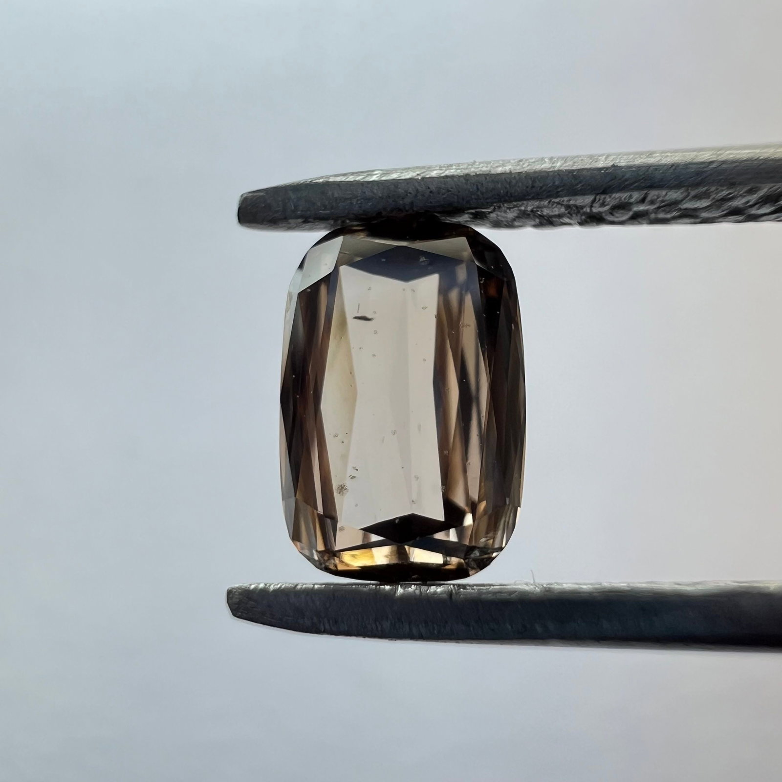Loose Diamond - CUSHION BRILLIANT 0.46ct Brown VS2: Loose Diamond - CUSHION BRILLIANT 0.46ct Brown VS2 Source: This is a real non-mined Diamond that has been grown in a lab Shape: CUSHION BRILLIANT Carats: 0.46 Color: Brown Certification: NONE The Diam