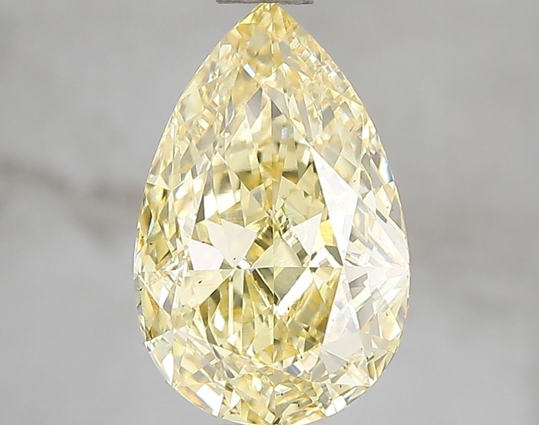 Loose Diamond - PEAR 3.05ct Fancy Vivid Yellow VS2: Loose Diamond - PEAR 3.05ct Fancy Vivid Yellow VS2 Source: This is a real non-mined Diamond that has been grown in a lab Shape: PEAR Carats: 3.05 Color: Fancy Vivid Yellow Certification: IGI Video: