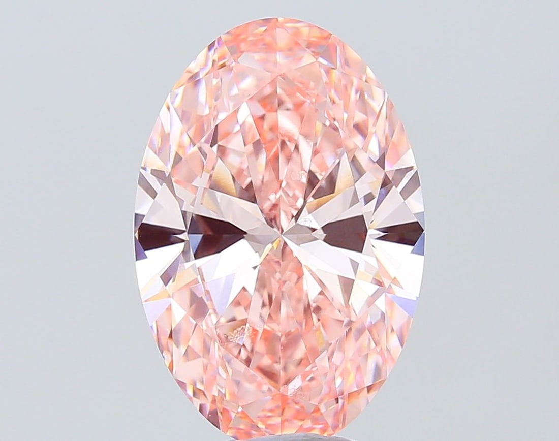 Loose Diamond - OVAL 7.57ct Fancy Vivid Pink VVS2: Loose Diamond - OVAL 7.57ct Fancy Vivid Pink VVS2 Source: This is a real non-mined Diamond that has been grown in a lab Shape: OVAL Carats: 7.57 Color: Fancy Vivid Pink Certification: IGI Video: