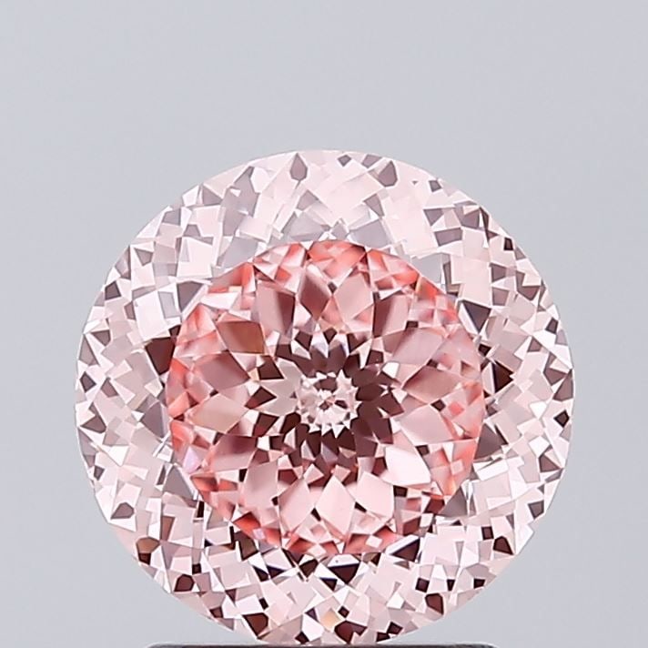Loose Diamond - ROUND 2.02ct Fancy Vivid Pink VVS2: Loose Diamond - ROUND 2.02ct Fancy Vivid Pink VVS2 Source: This is a real non-mined Diamond that has been grown in a lab Shape: ROUND Carats: 2.02 Color: Fancy Vivid Pink Certification: IGI Video:
