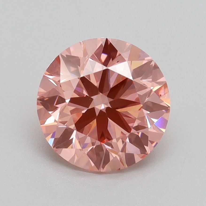 Ideal Loose Diamond - ROUND 1.71ct Fancy Vivid Pink VS2: Ideal Loose Diamond - ROUND 1.71ct Fancy Vivid Pink VS2 Source: This is a real non-mined Diamond that has been grown in a lab Shape: ROUND Carats: 1.71 Color: Fancy Vivid Pink Certification: IGI Video