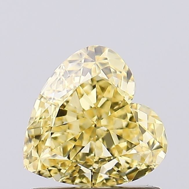 Loose Diamond - HEART 1.05ct Fancy Intense Yellow VS1: Loose Diamond - HEART 1.05ct Fancy Intense Yellow VS1 Source: This is a real non-mined Diamond that has been grown in a lab Shape: HEART Carats: 1.05 Color: Fancy Intense Yellow Certification: IGI Vid
