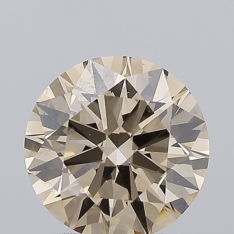 Loose Diamond - ROUND 2.01ct Fancy Brown VS2: Loose Diamond - ROUND 2.01ct Fancy Brown VS2 Source: This is a real non-mined Diamond that has been grown in a lab Shape: ROUND Carats: 2.01 Color: Fancy Brown Certification: NONE Video:
