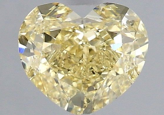 Loose Diamond - HEART 1.1ct Fancy Yellow VS1: Loose Diamond - HEART 1.1ct Fancy Yellow VS1 Source: This is a real non-mined Diamond that has been grown in a lab Shape: HEART Carats: 1.1 Color: Fancy Yellow Certification: IGI Video: Video Link