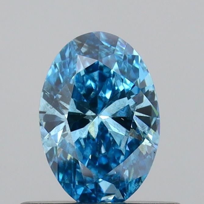 Loose Diamond - OVAL 0.41ct Fancy Vivid Blue SI2: Loose Diamond - OVAL 0.41ct Fancy Vivid Blue SI2 Source: This is a real non-mined Diamond that has been grown in a lab Shape: OVAL Carats: 0.41 Color: Fancy Vivid Blue Certification: IGI Video: