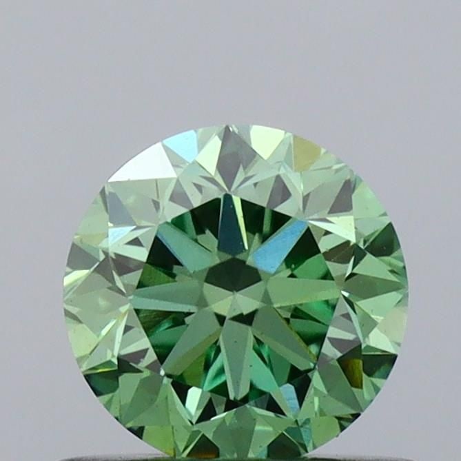 Loose Diamond - ROUND 0.62ct Fancy Vivid Green VS1: Loose Diamond - ROUND 0.62ct Fancy Vivid Green VS1 Source: This is a real non-mined Diamond that has been grown in a lab Shape: ROUND Carats: 0.62 Color: Fancy Vivid Green Certification: IGI Video: