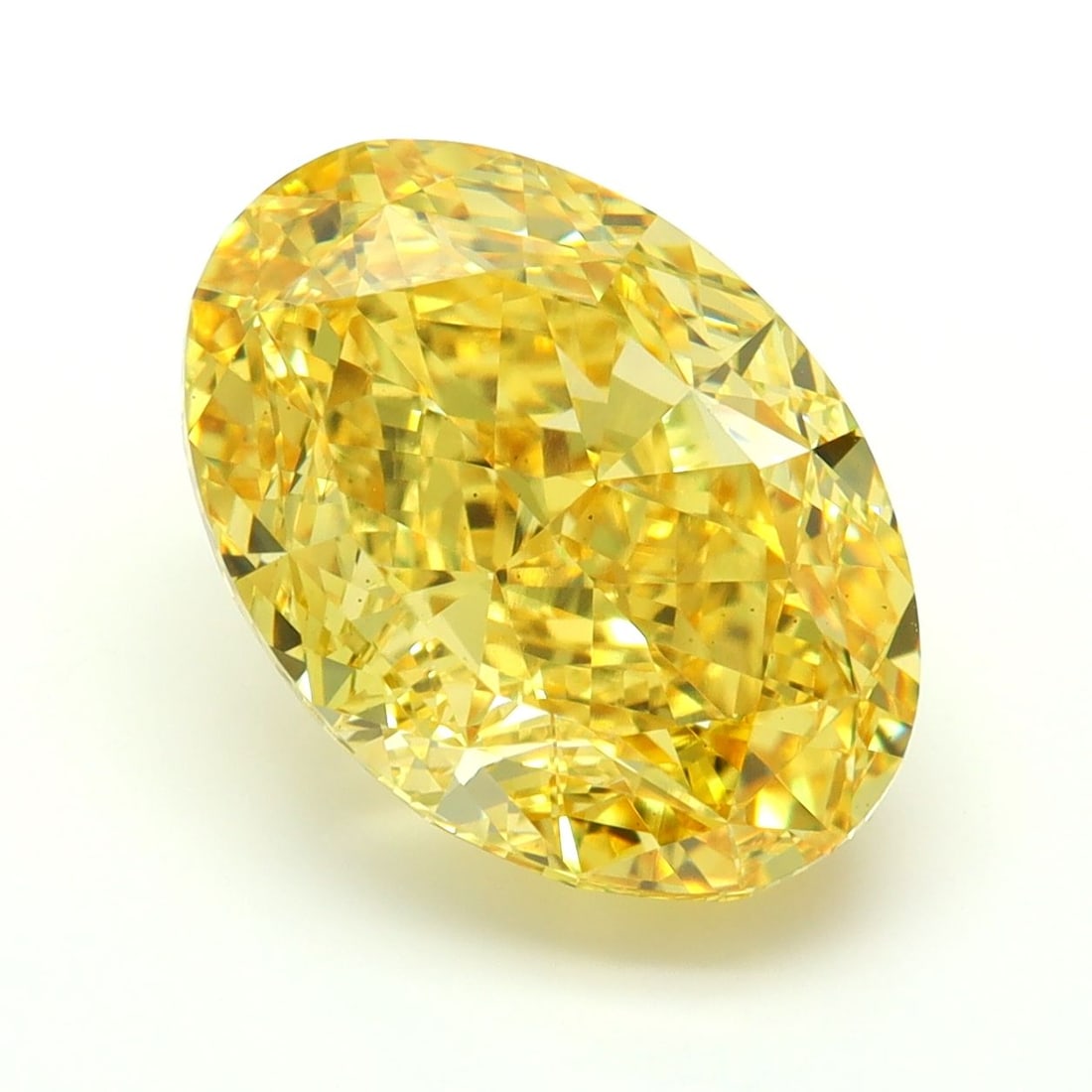 Loose Diamond - OVAL 7.07ct Fancy Vivid Yellow VS1: Loose Diamond - OVAL 7.07ct Fancy Vivid Yellow VS1 Source: This is a real non-mined Diamond that has been grown in a lab Shape: OVAL Carats: 7.07 Color: Fancy Vivid Yellow Certification: IGI Video:
