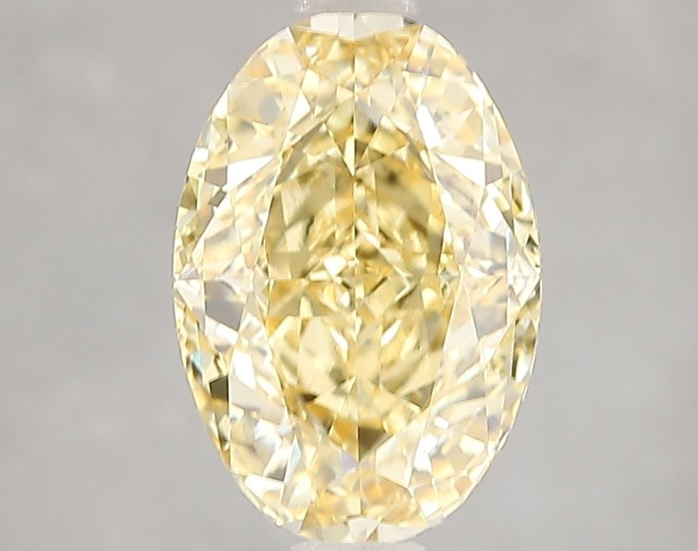 Loose Diamond - OVAL 3.02ct Fancy Intense Yellow VS2: Loose Diamond - OVAL 3.02ct Fancy Intense Yellow VS2 Source: This is a real non-mined Diamond that has been grown in a lab Shape: OVAL Carats: 3.02 Color: Fancy Intense Yellow Certification: IGI Video