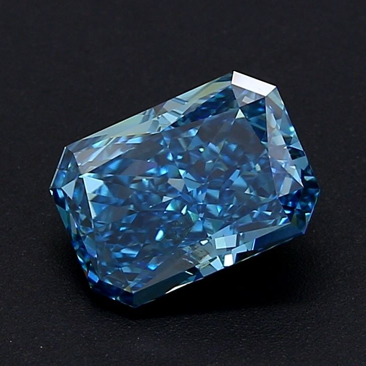 Loose Diamond - RADIANT 3.01ct Fancy Vivid Blue VVS2: Loose Diamond - RADIANT 3.01ct Fancy Vivid Blue VVS2 Source: This is a real non-mined Diamond that has been grown in a lab Shape: RADIANT Carats: 3.01 Color: Fancy Vivid Blue Certification: IGI Video: