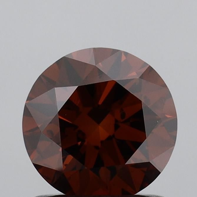 Loose Diamond - ROUND 1.01ct Fancy Deep Orange SI2: Loose Diamond - ROUND 1.01ct Fancy Deep Orange SI2 Source: This is a real non-mined Diamond that has been grown in a lab Shape: ROUND Carats: 1.01 Color: Fancy Deep Orange Certification: IGI Video: