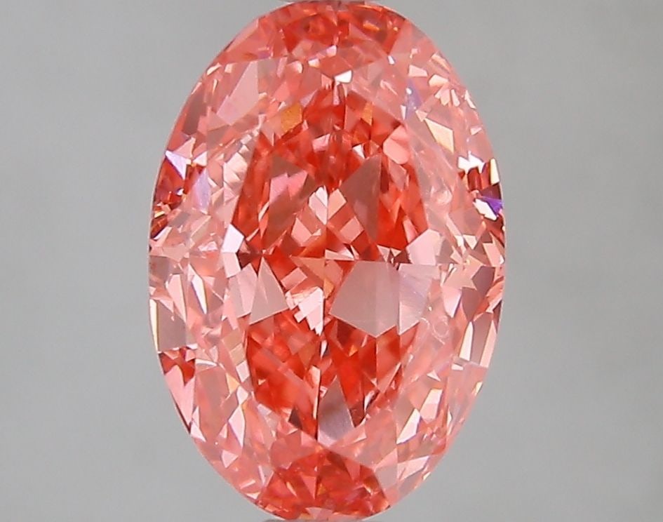 Loose Diamond - OVAL 3.05ct Fancy Vivid Pink VVS2: Loose Diamond - OVAL 3.05ct Fancy Vivid Pink VVS2 Source: This is a real non-mined Diamond that has been grown in a lab Shape: OVAL Carats: 3.05 Color: Fancy Vivid Pink Certification: IGI Video: