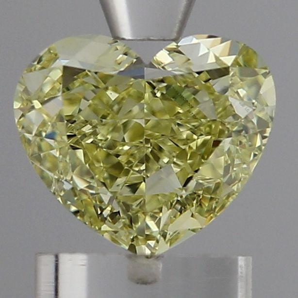 Loose Diamond - HEART 1.28ct Fancy Yellow VVS2: Loose Diamond - HEART 1.28ct Fancy Yellow VVS2 Source: This is a real non-mined Diamond that has been grown in a lab Shape: HEART Carats: 1.28 Color: Fancy Yellow Certification: IGI Video: