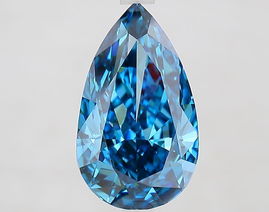 Loose Diamond - PEAR 3.23ct Fancy Vivid Blue VS1: Loose Diamond - PEAR 3.23ct Fancy Vivid Blue VS1 Source: This is a real non-mined Diamond that has been grown in a lab Shape: PEAR Carats: 3.23 Color: Fancy Vivid Blue Certification: IGI Video: