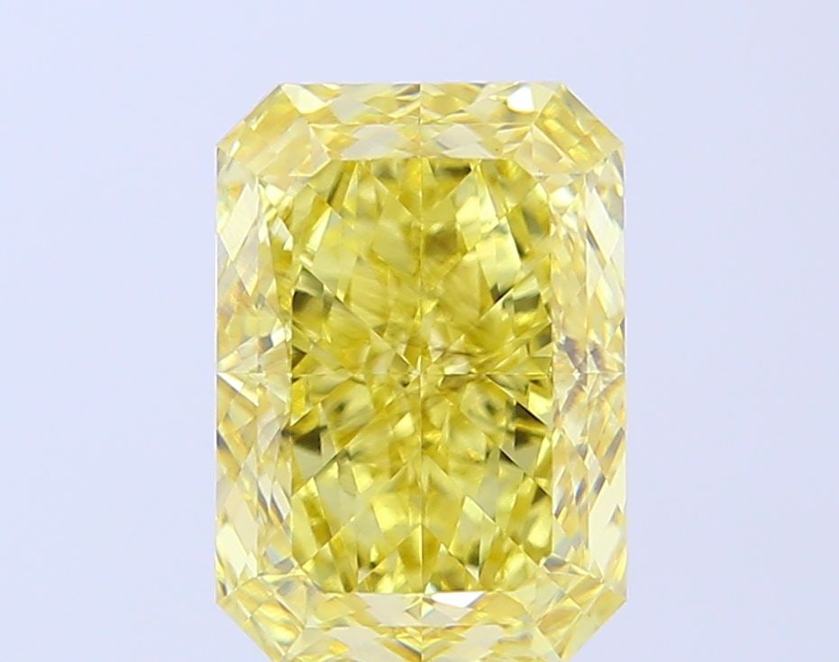 Loose Diamond - RADIANT 5.14ct Fancy Vivid Yellow VS2: Loose Diamond - RADIANT 5.14ct Fancy Vivid Yellow VS2 Source: This is a real non-mined Diamond that has been grown in a lab Shape: RADIANT Carats: 5.14 Color: Fancy Vivid Yellow Certification: IGI Vid