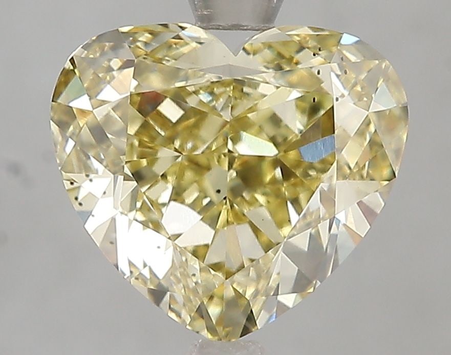 Loose Diamond - HEART 4.01ct Fancy Intense Yellow SI1: Loose Diamond - HEART 4.01ct Fancy Intense Yellow SI1 Source: This is a real non-mined Diamond that has been grown in a lab Shape: HEART Carats: 4.01 Color: Fancy Intense Yellow Certification: IGI Vid