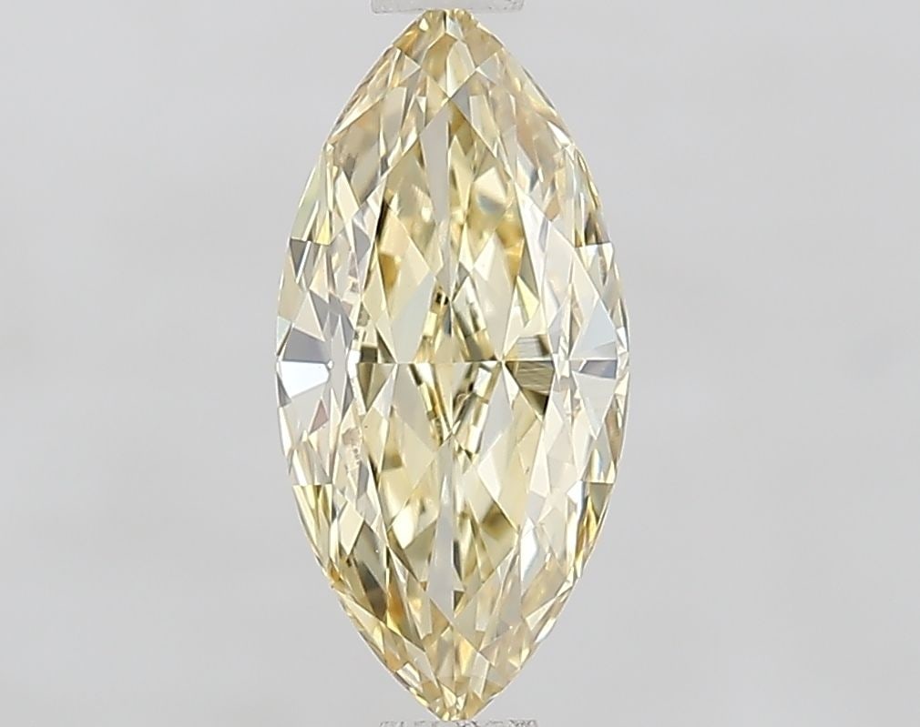 Loose Diamond - MARQUISE 1.09ct Fancy Yellow VVS2: Loose Diamond - MARQUISE 1.09ct Fancy Yellow VVS2 Source: This is a real non-mined Diamond that has been grown in a lab Shape: MARQUISE Carats: 1.09 Color: Fancy Yellow Certification: IGI Video: