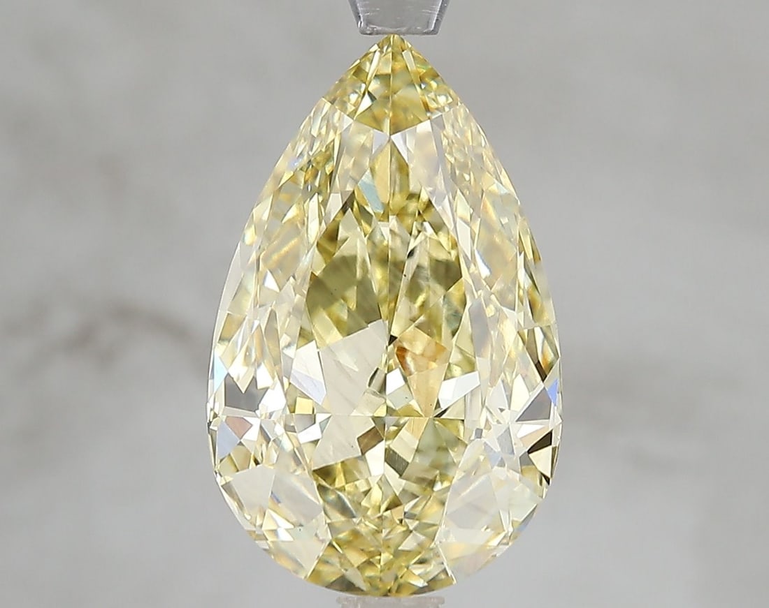 Loose Diamond - PEAR 5.15ct Fancy Intense Yellow VS2: Loose Diamond - PEAR 5.15ct Fancy Intense Yellow VS2 Source: This is a real non-mined Diamond that has been grown in a lab Shape: PEAR Carats: 5.15 Color: Fancy Intense Yellow Certification: IGI Video
