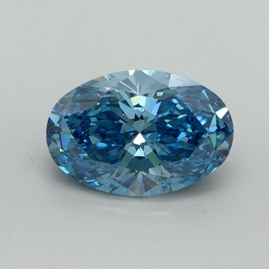 Loose Diamond - OVAL 2.05ct Fancy Vivid Blue VS2: Loose Diamond - OVAL 2.05ct Fancy Vivid Blue VS2 Source: This is a real non-mined Diamond that has been grown in a lab Shape: OVAL Carats: 2.05 Color: Fancy Vivid Blue Certification: IGI Video: