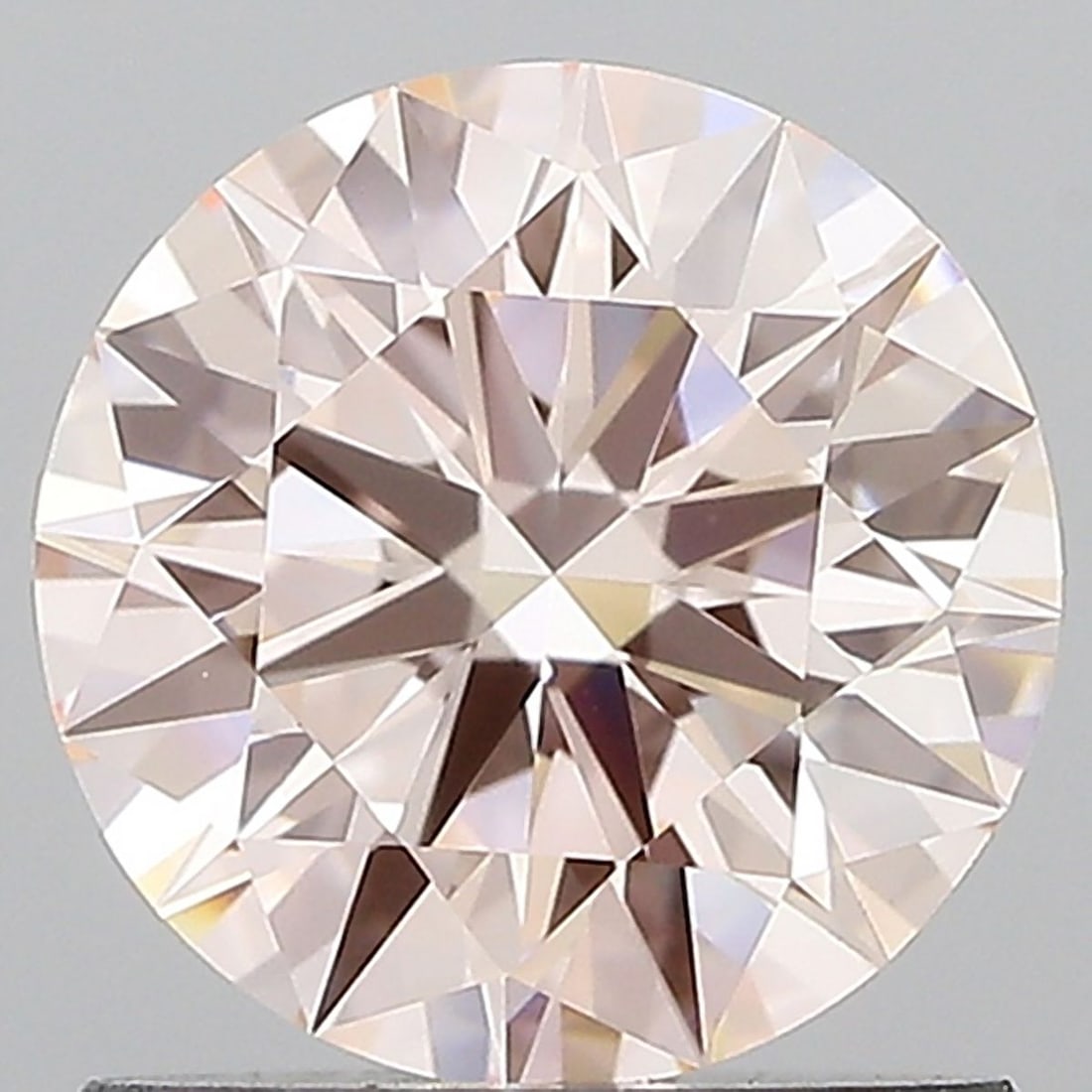 Ideal Loose Diamond - ROUND 1.04ct Fancy Pink VVS1: Ideal Loose Diamond - ROUND 1.04ct Fancy Pink VVS1 Source: This is a real non-mined Diamond that has been grown in a lab Shape: ROUND Carats: 1.04 Color: Fancy Pink Certification: IGI Video: