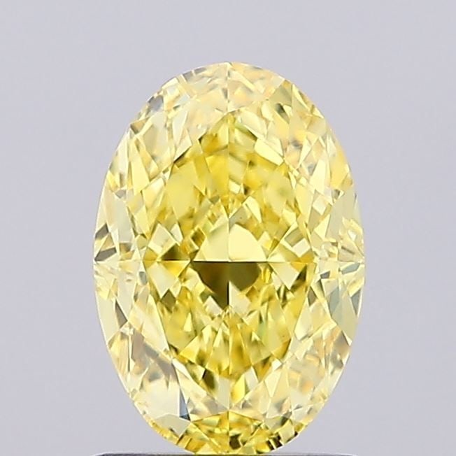 Loose Diamond - OVAL 1.15ct Fancy Vivid Yellow VS1: Loose Diamond - OVAL 1.15ct Fancy Vivid Yellow VS1 Source: This is a real non-mined Diamond that has been grown in a lab Shape: OVAL Carats: 1.15 Color: Fancy Vivid Yellow Certification: IGI Video: