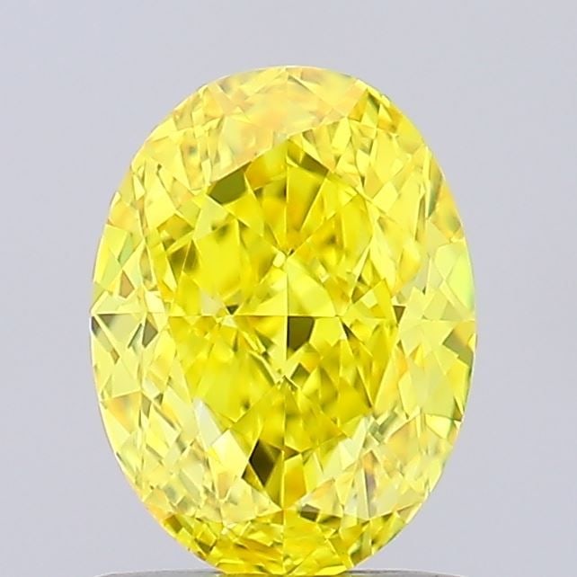 Loose Diamond - OVAL 1.26ct Fancy Vivid Yellow VVS2: Loose Diamond - OVAL 1.26ct Fancy Vivid Yellow VVS2 Source: This is a real non-mined Diamond that has been grown in a lab Shape: OVAL Carats: 1.26 Color: Fancy Vivid Yellow Certification: IGI Video: