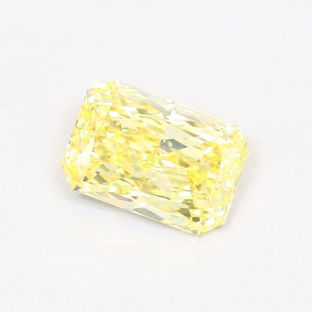 Loose Diamond - RADIANT 0.96ct Fancy Vivid Yellow VS1: Loose Diamond - RADIANT 0.96ct Fancy Vivid Yellow VS1 Source: This is a real non-mined Diamond that has been grown in a lab Shape: RADIANT Carats: 0.96 Color: Fancy Vivid Yellow Certification: IGI Vid