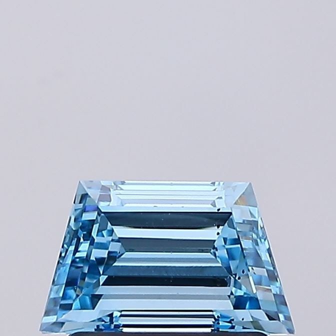 Loose Diamond - TRAPEZOID 0.78ct Fancy Vivid Blue VS2: Loose Diamond - TRAPEZOID 0.78ct Fancy Vivid Blue VS2 Source: This is a real non-mined Diamond that has been grown in a lab Shape: TRAPEZOID Carats: 0.78 Color: Fancy Vivid Blue Certification: NONE Vi