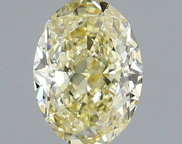 Loose Diamond - OVAL 1.02ct Fancy Yellow VS1: Loose Diamond - OVAL 1.02ct Fancy Yellow VS1 Source: This is a real non-mined Diamond that has been grown in a lab Shape: OVAL Carats: 1.02 Color: Fancy Yellow Certification: IGI Video: