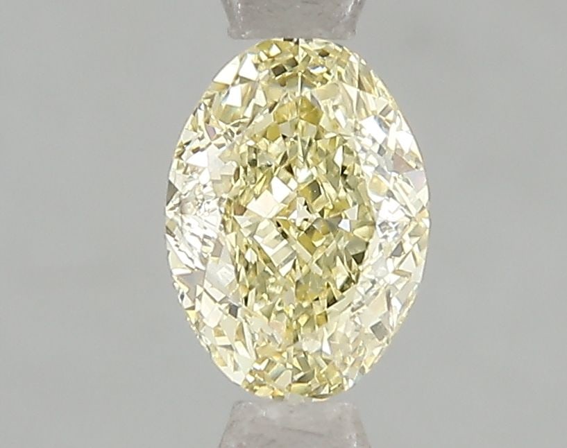 Loose Diamond - OVAL 1.03ct Fancy Yellow VS1: Loose Diamond - OVAL 1.03ct Fancy Yellow VS1 Source: This is a real non-mined Diamond that has been grown in a lab Shape: OVAL Carats: 1.03 Color: Fancy Yellow Certification: IGI Video: