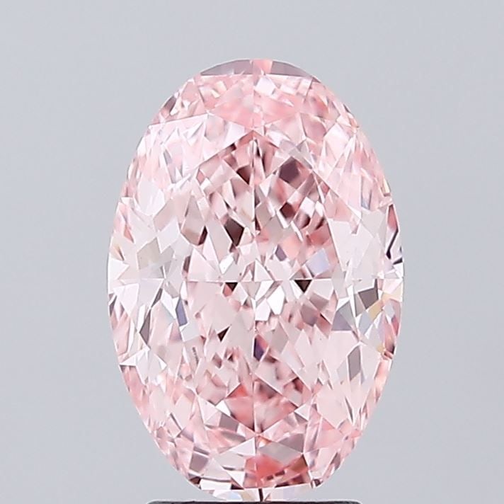 Loose Diamond - OVAL 3.0ct Fancy Vivid Pink VVS2: Loose Diamond - OVAL 3.0ct Fancy Vivid Pink VVS2 Source: This is a real non-mined Diamond that has been grown in a lab Shape: OVAL Carats: 3.0 Color: Fancy Vivid Pink Certification: IGI Video: