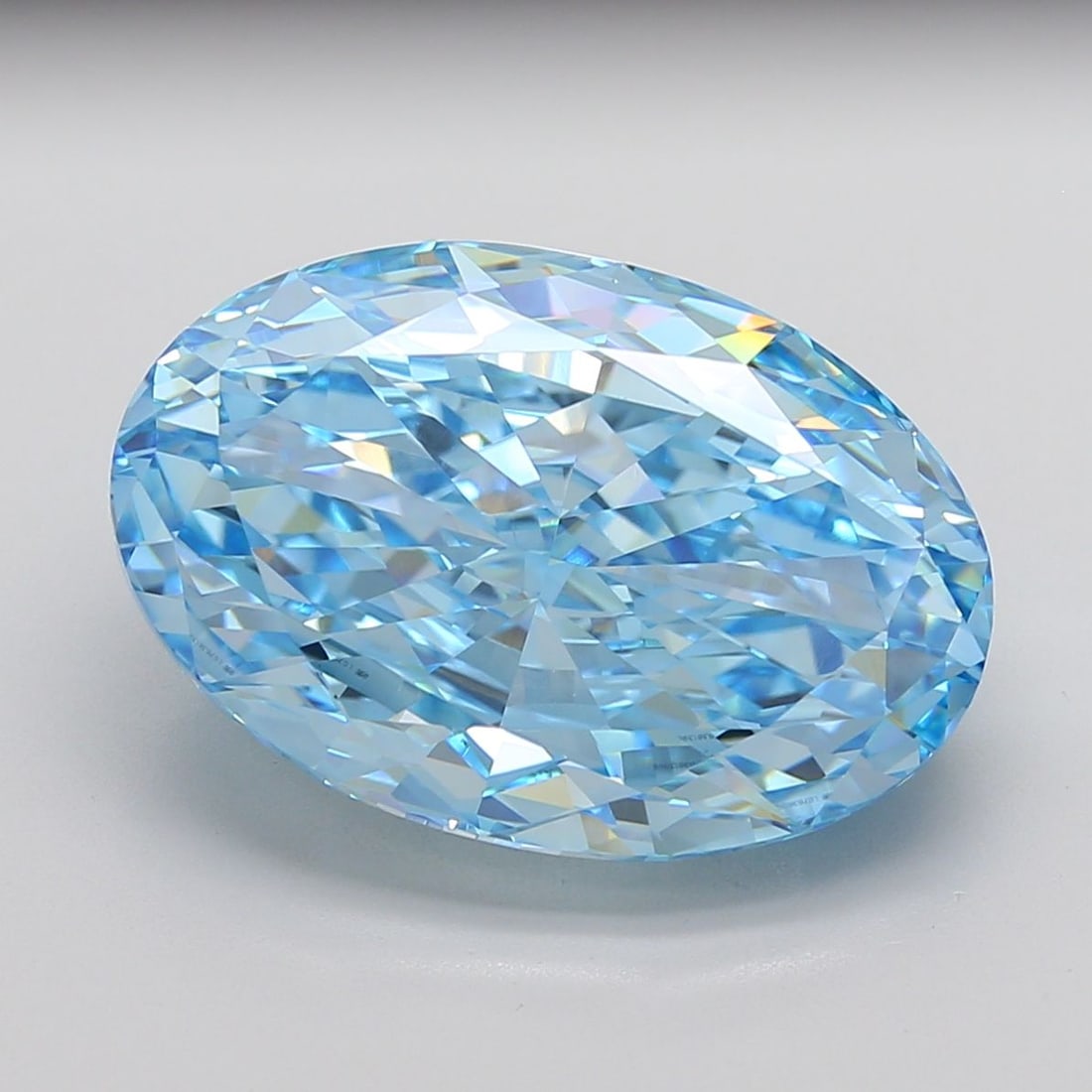 Loose Diamond - OVAL 20.09ct Fancy Vivid Blue VVS2: Loose Diamond - OVAL 20.09ct Fancy Vivid Blue VVS2 Source: This is a real non-mined Diamond that has been grown in a lab Shape: OVAL Carats: 20.09 Color: Fancy Vivid Blue Certification: IGI The Diamon