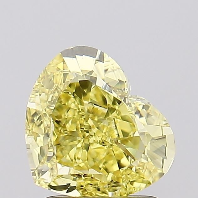 Loose Diamond - HEART 1.7ct Fancy Vivid Yellow VS2: Loose Diamond - HEART 1.7ct Fancy Vivid Yellow VS2 Source: This is a real non-mined Diamond that has been grown in a lab Shape: HEART Carats: 1.7 Color: Fancy Vivid Yellow Certification: IGI Video: