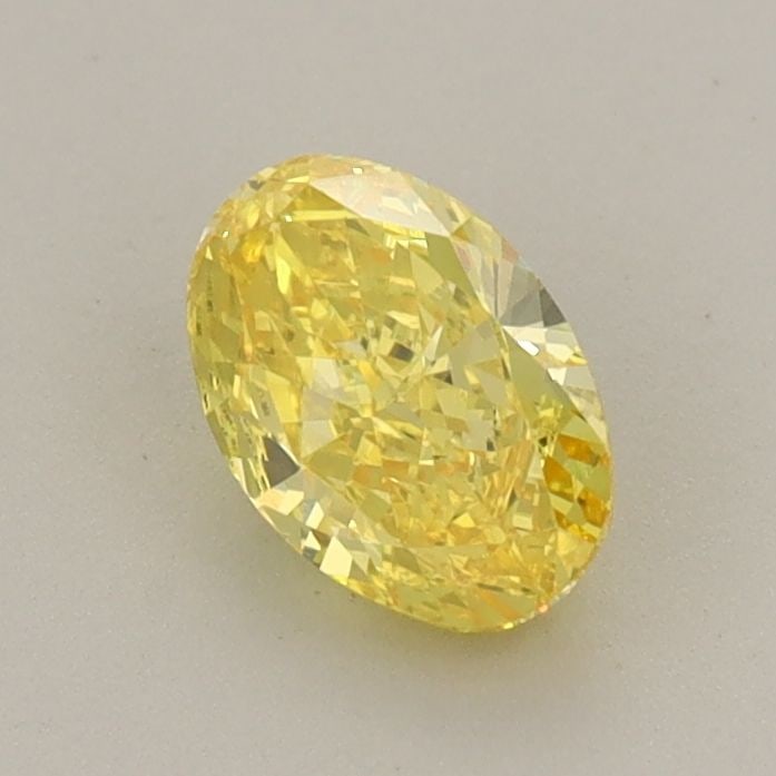 Loose Diamond - OVAL 0.69ct Fancy Vivid Yellow VS1: Loose Diamond - OVAL 0.69ct Fancy Vivid Yellow VS1 Source: This is a real non-mined Diamond that has been grown in a lab Shape: OVAL Carats: 0.69 Color: Fancy Vivid Yellow Certification: IGI The