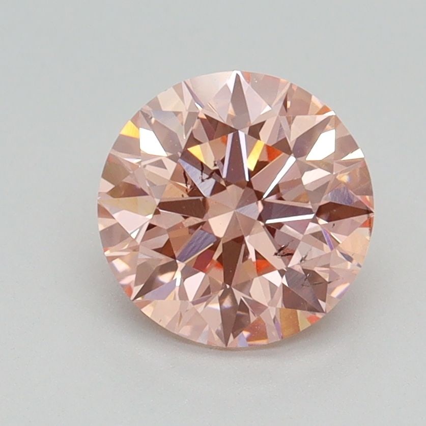 Loose Diamond - ROUND 1.53ct Fancy Intense Pink SI1: Loose Diamond - ROUND 1.53ct Fancy Intense Pink SI1 Source: This is a real non-mined Diamond that has been grown in a lab Shape: ROUND Carats: 1.53 Color: Fancy Intense Pink Certification: IGI Video: