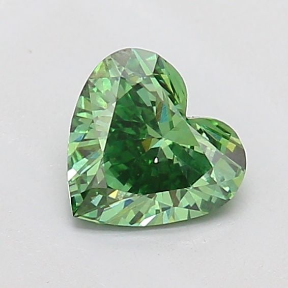 Loose Diamond - HEART 0.56ct Fancy Vivid Green VS1: Loose Diamond - HEART 0.56ct Fancy Vivid Green VS1 Source: This is a real non-mined Diamond that has been grown in a lab Shape: HEART Carats: 0.56 Color: Fancy Vivid Green Certification: IGI Video: