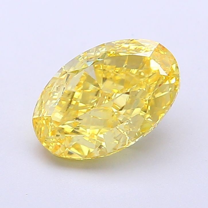 Loose Diamond - OVAL 2.03ct Fancy Vivid Yellow VVS2: Loose Diamond - OVAL 2.03ct Fancy Vivid Yellow VVS2 Source: This is a real non-mined Diamond that has been grown in a lab Shape: OVAL Carats: 2.03 Color: Fancy Vivid Yellow Certification: IGI Video: