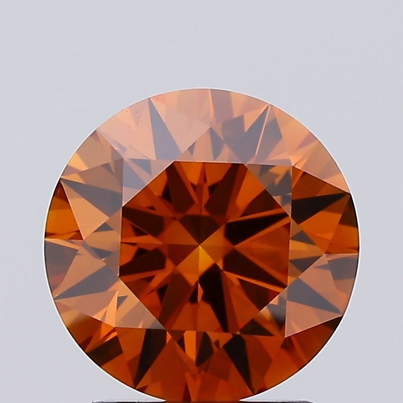 Ideal Loose Diamond - ROUND 2.11ct Fancy Vivid Orange VS1: Ideal Loose Diamond - ROUND 2.11ct Fancy Vivid Orange VS1 Source: This is a real non-mined Diamond that has been grown in a lab Shape: ROUND Carats: 2.11 Color: Fancy Vivid Orange Certification: IGI V