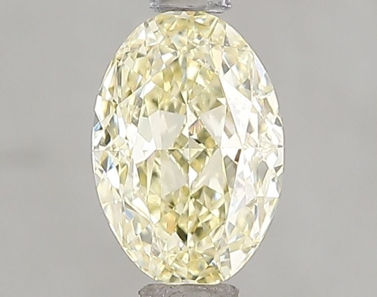 Loose Diamond - OVAL 1.07ct Fancy Yellow VVS2: Loose Diamond - OVAL 1.07ct Fancy Yellow VVS2 Source: This is a real non-mined Diamond that has been grown in a lab Shape: OVAL Carats: 1.07 Color: Fancy Yellow Certification: IGI Video: