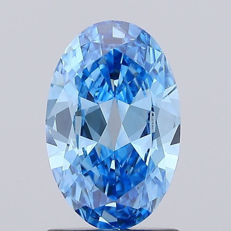 Loose Diamond - OVAL 1.34ct Fancy Vivid Blue VVS2: Loose Diamond - OVAL 1.34ct Fancy Vivid Blue VVS2 Source: This is a real non-mined Diamond that has been grown in a lab Shape: OVAL Carats: 1.34 Color: Fancy Vivid Blue Certification: IGI Video: