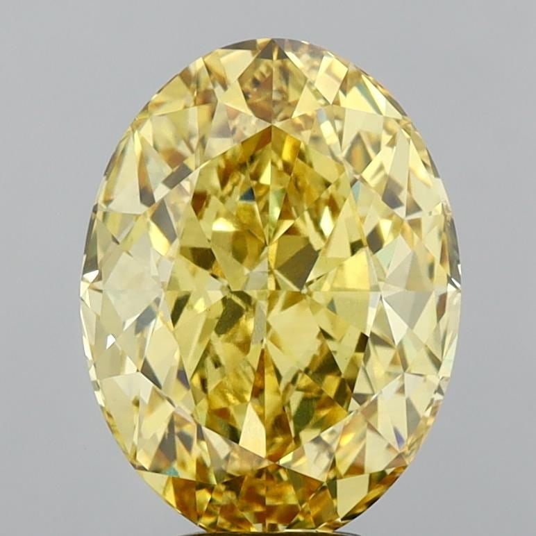 Loose Diamond - OVAL 7.21ct Fancy Vivid Yellow VS1: Loose Diamond - OVAL 7.21ct Fancy Vivid Yellow VS1 Source: This is a real non-mined Diamond that has been grown in a lab Shape: OVAL Carats: 7.21 Color: Fancy Vivid Yellow Certification: IGI Video: