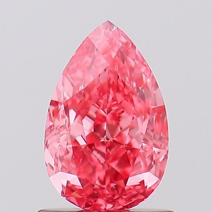 Loose Diamond - PEAR 1.02ct Fancy Vivid Pink VS2: Loose Diamond - PEAR 1.02ct Fancy Vivid Pink VS2 Source: This is a real non-mined Diamond that has been grown in a lab Shape: PEAR Carats: 1.02 Color: Fancy Vivid Pink Certification: IGI Video: