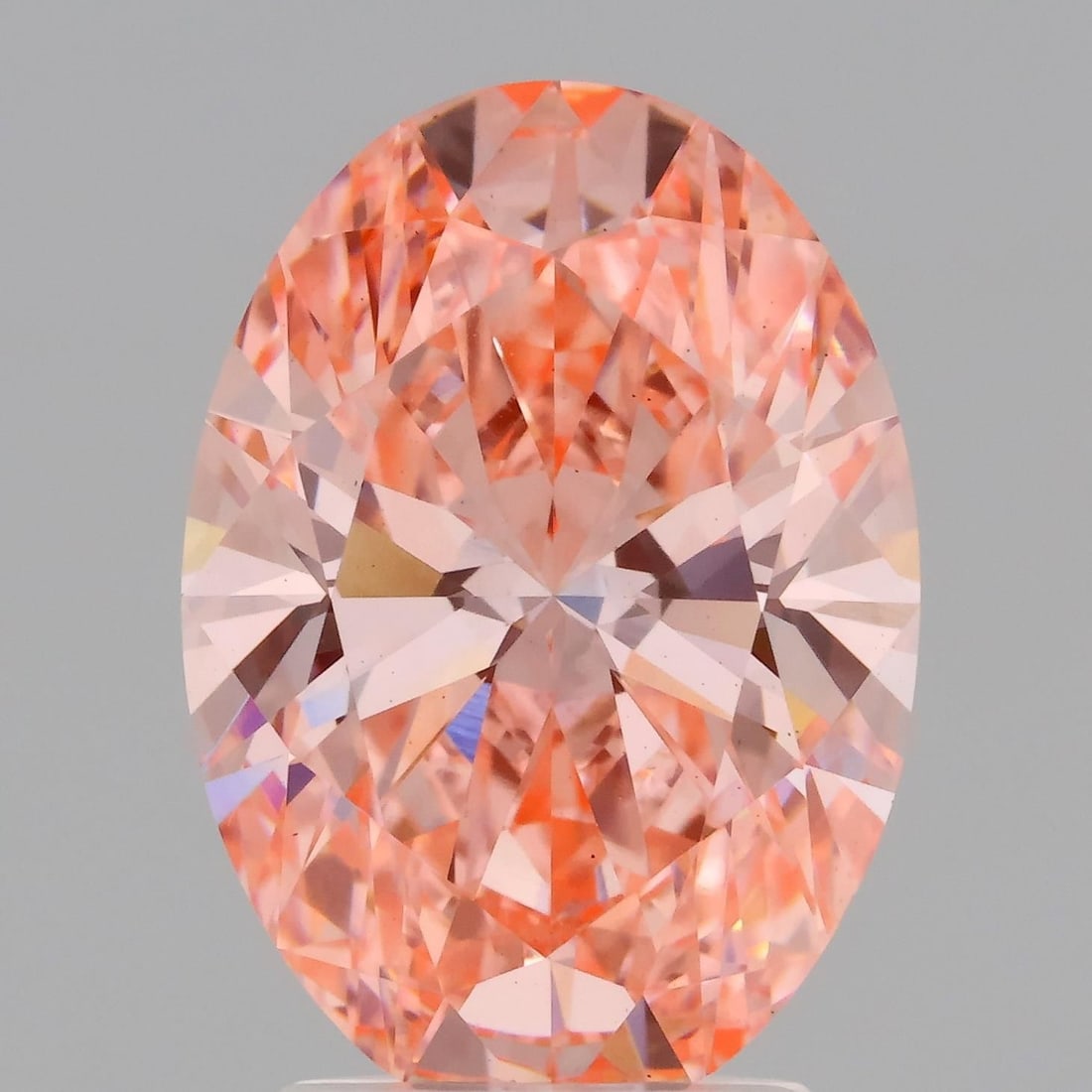 Loose Diamond - OVAL 3.09ct Fancy Vivid Pink VS1: Loose Diamond - OVAL 3.09ct Fancy Vivid Pink VS1 Source: This is a real non-mined Diamond that has been grown in a lab Shape: OVAL Carats: 3.09 Color: Fancy Vivid Pink Certification: IGI Video: