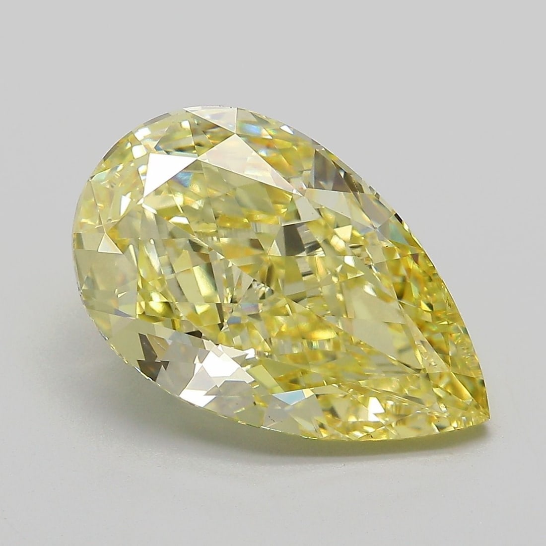Loose Diamond - PEAR 6.08ct Fancy Intense Yellow VVS2: Loose Diamond - PEAR 6.08ct Fancy Intense Yellow VVS2 Source: This is a real non-mined Diamond that has been grown in a lab Shape: PEAR Carats: 6.08 Color: Fancy Intense Yellow Certification: IGI Vide