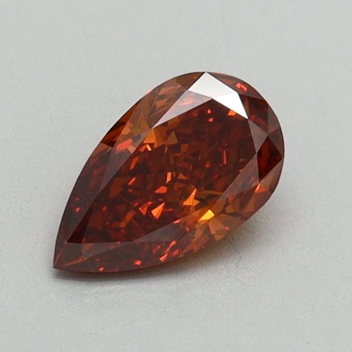 Loose Diamond - PEAR 0.55ct Fancy Orange VS1: Loose Diamond - PEAR 0.55ct Fancy Orange VS1 Source: This is a real non-mined Diamond that has been grown in a lab Shape: PEAR Carats: 0.55 Color: Fancy Orange Certification: IGI Video: