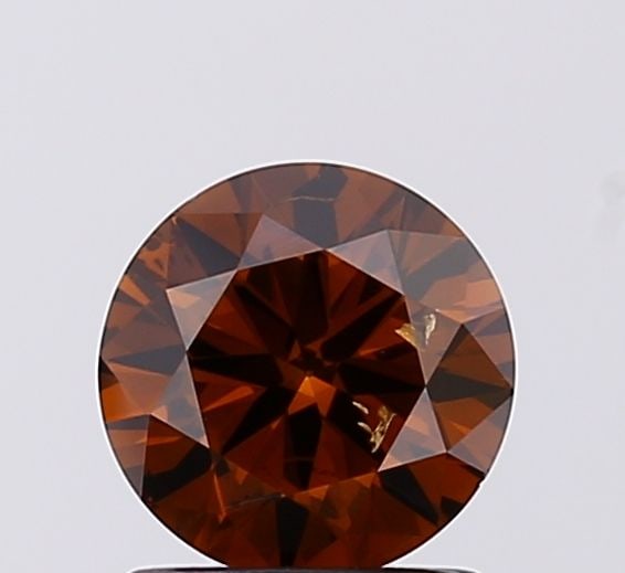 Loose Diamond - ROUND 1.02ct Fancy Deep Brown SI1: Loose Diamond - ROUND 1.02ct Fancy Deep Brown SI1 Source: This is a real non-mined Diamond that has been grown in a lab Shape: ROUND Carats: 1.02 Color: Fancy Deep Brown Certification: IGI Video: