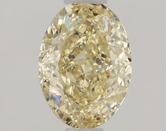 Loose Diamond - OVAL 1.03ct Fancy Light Yellow VS1: Loose Diamond - OVAL 1.03ct Fancy Light Yellow VS1 Source: This is a real non-mined Diamond that has been grown in a lab Shape: OVAL Carats: 1.03 Color: Fancy Light Yellow Certification: IGI Video: