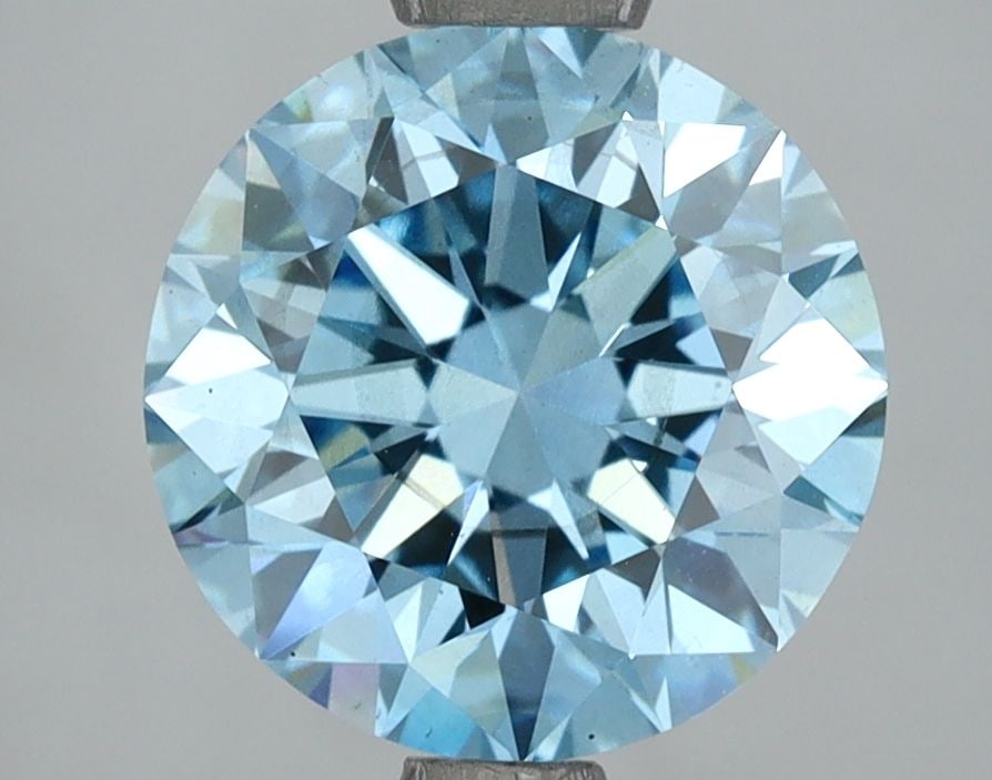 Loose Diamond - ROUND 3.02ct Fancy Vivid Blue SI1: Loose Diamond - ROUND 3.02ct Fancy Vivid Blue SI1 Source: This is a real non-mined Diamond that has been grown in a lab Shape: ROUND Carats: 3.02 Color: Fancy Vivid Blue Certification: IGI Video: